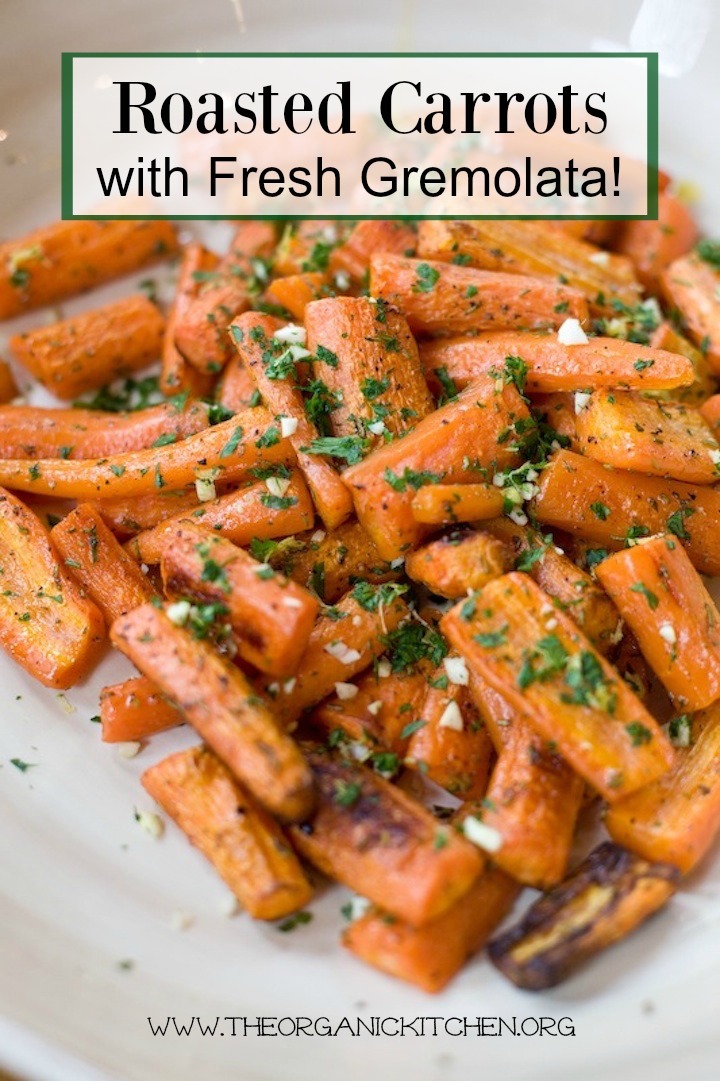 A large white bowl filled with Roasted Carrots and Gremolata