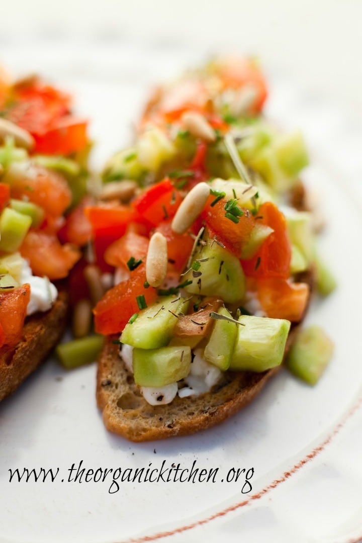 Cucumber Tomato Tartines on white plate