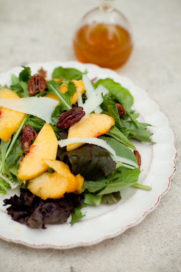10 Peach Recipes for Summer Greens with Peaches and Manchego Cheese on white plate