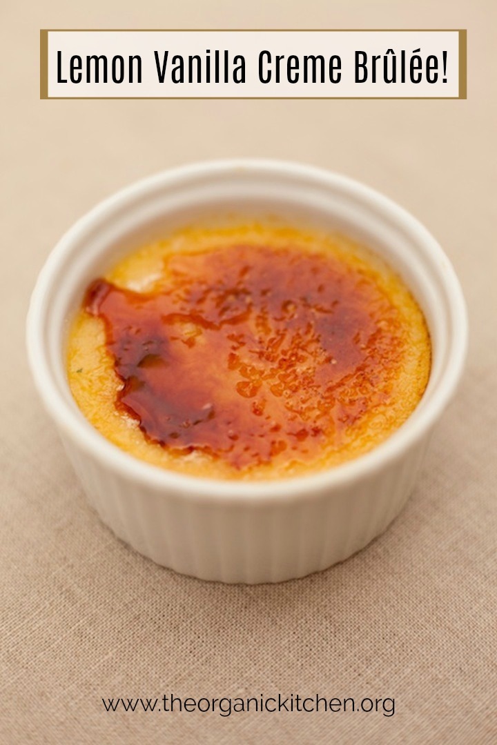 Lemon Vanilla Creme Brûlée! in a white ramekin on a beige tablecloth