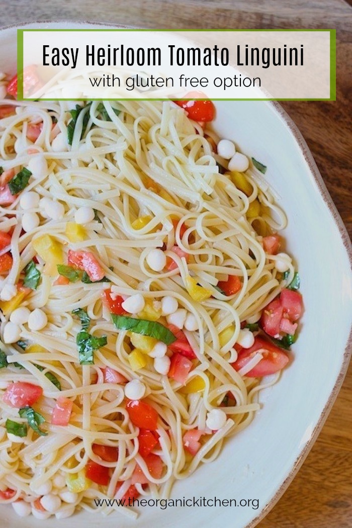 Heirloom Tomato Linguini in a white bowl on wooden table