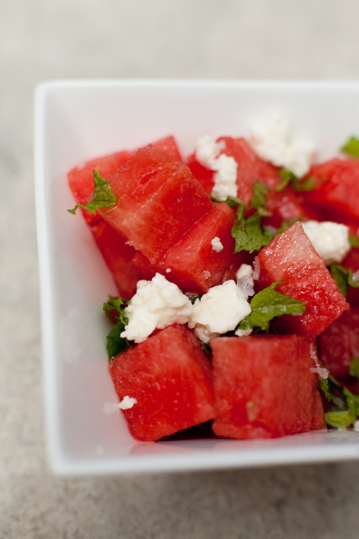 Watermelon Salad with Mint and Feta in a square white bowl