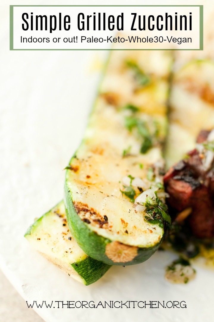 A close up of Simple Grilled Zucchini on a white plate