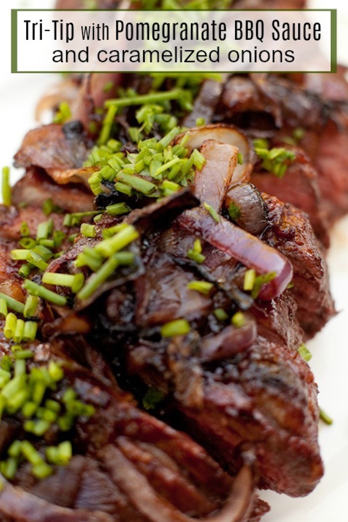 Tri-Tip with Pomegranate BBQ Sauce and Caramelized Onions on white plate