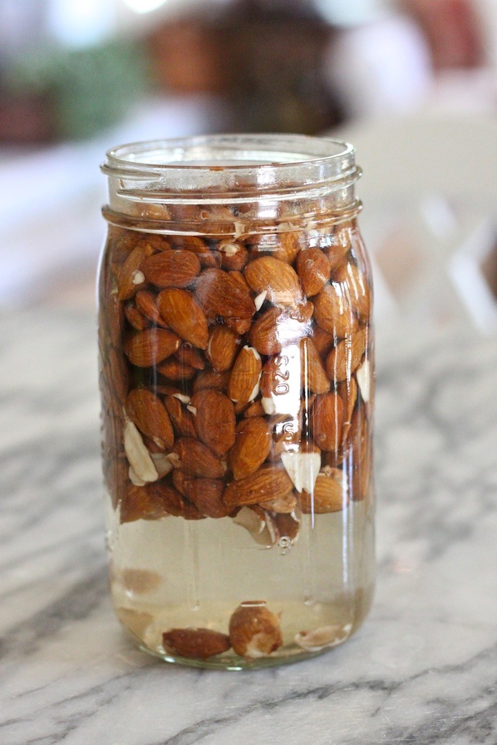 Almonds soaking in a jar of water. How to Make Almond Milk