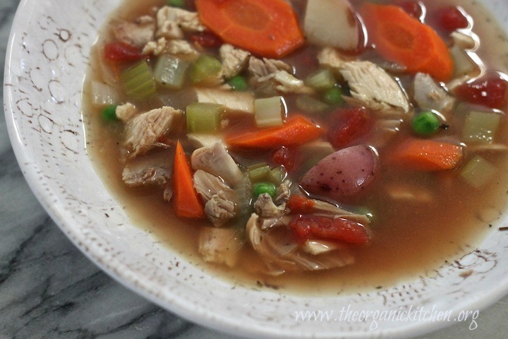 Chunky Chicken and Vegetable Soup in a white and grey bowl