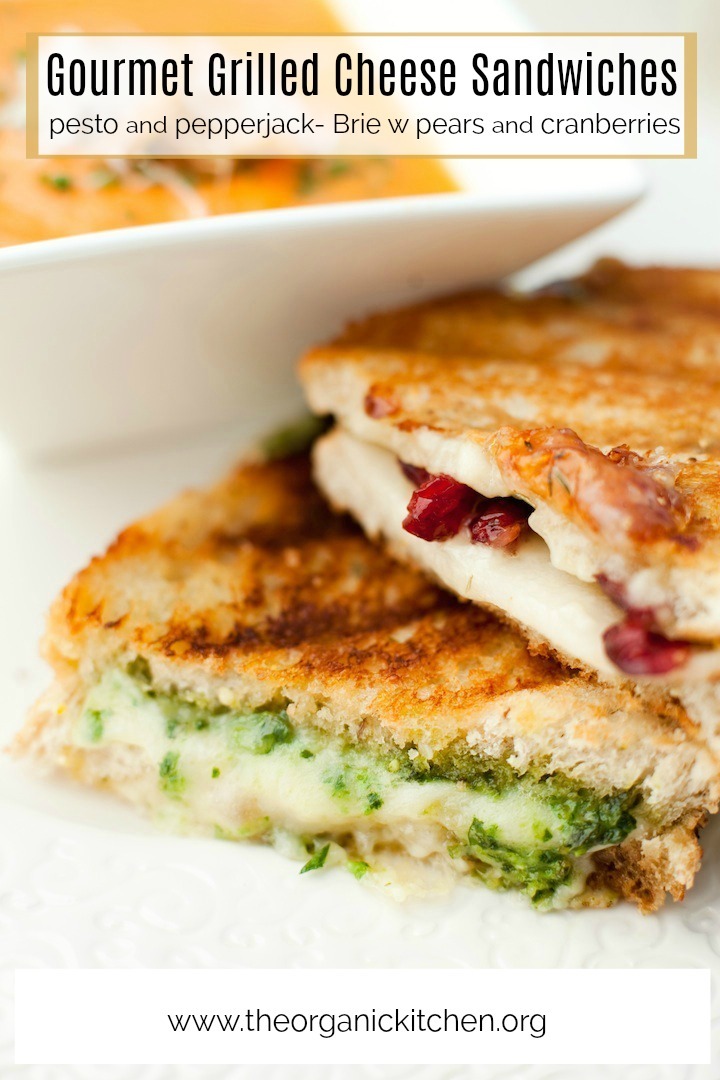  Gourmet Grilled Cheese Sandwiches on a white plate in front of a bowl of tomato soup