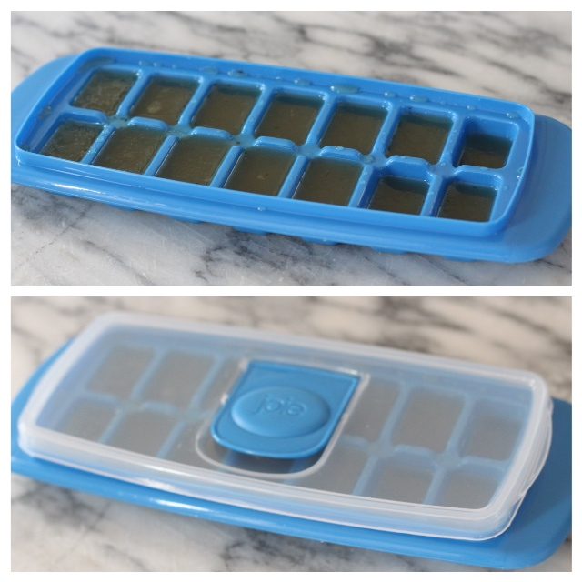 Two blue ice cube trays filled with bone broth