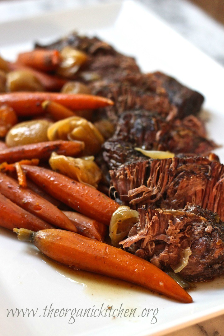 This slow cooker roast with vegetables is a family favorite Sunday dinner. It's an entire dinner in one crock pot. The meat is SO tender and delicious! This is a must-make!