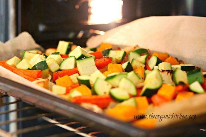 Vegetables on cookie sheet going into the oven. Roasted Vegetable Soup!
