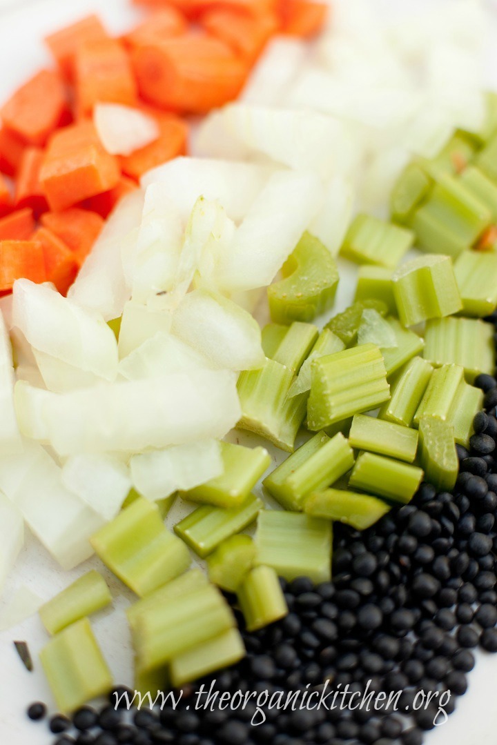 Chopped carrots, celery, onions and black lentils to be used in Hearty Lentil Soup!