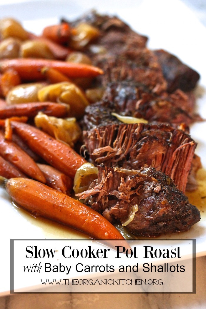 Slow Cooker Pot Roast with Shallots and Baby Carrots on white platter