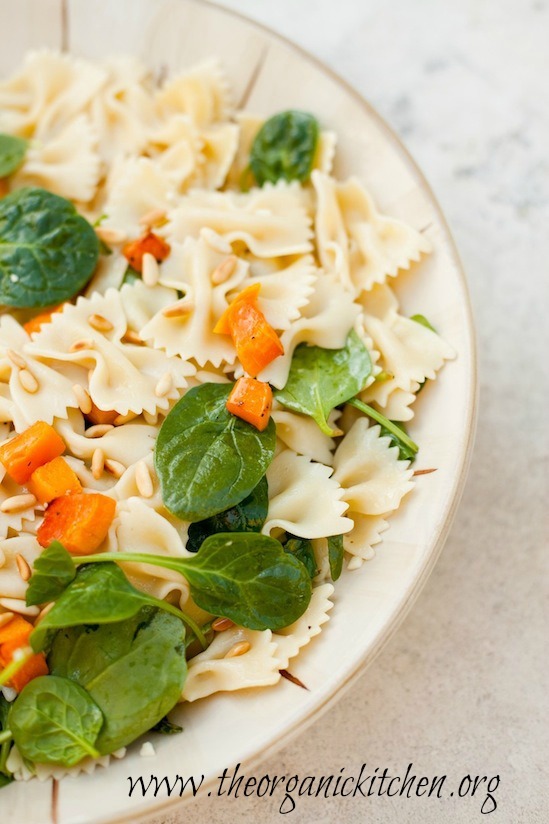 Farfalle Pasta with Roasted Butternut Squash in a large bowl on marble table