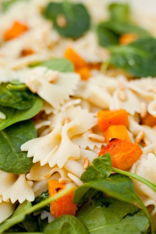 A close up of Farfalle with Roasted Butternut Squash and Baby Spinach 