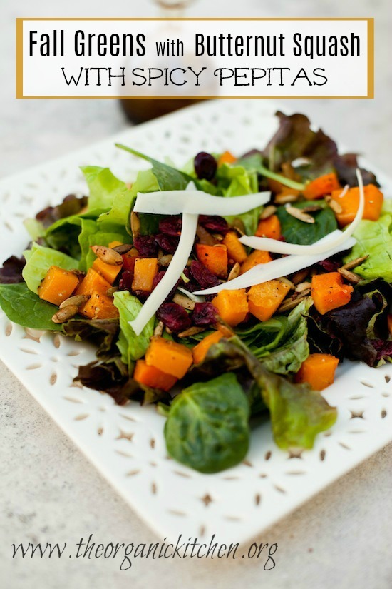 A white dish with Fall Greens with Roasted Butternut Squash and Spicy Pepitas 