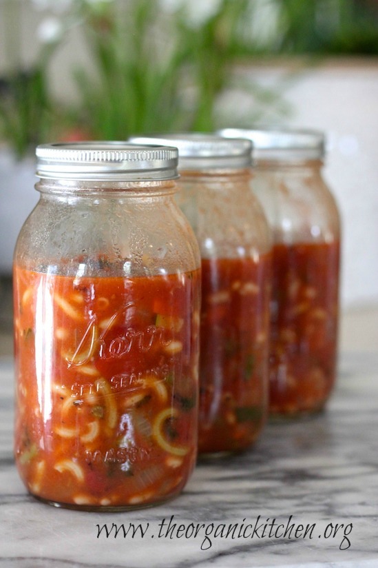 Three mason jars filled with Gluten Free Minestrone with Pancaetta