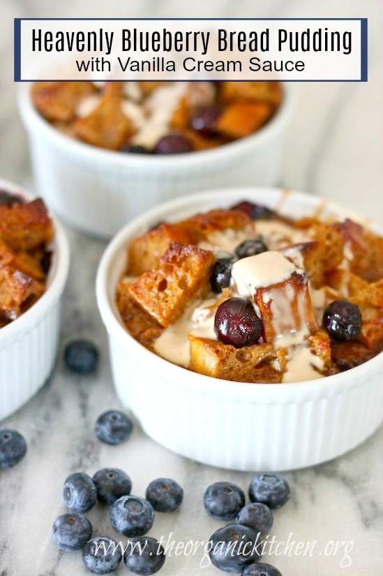 Heavenly Blueberry Bread Pudding in white ramekins on marble surface