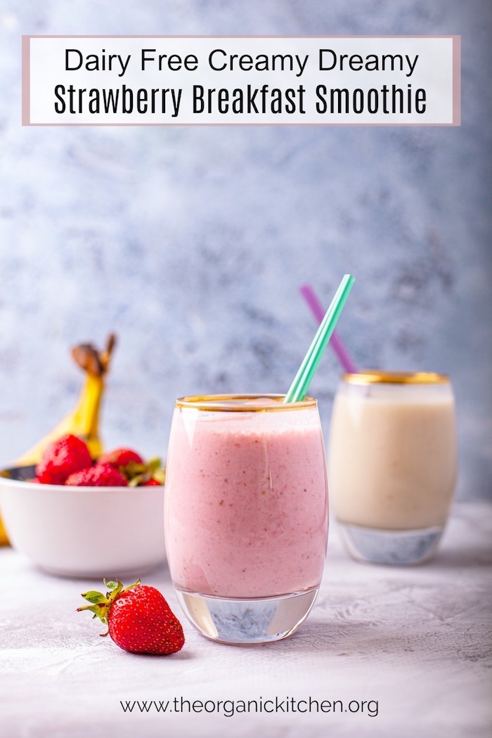 Dairy Free "Creamy Dreamy Strawberry Breakfast Smoothie" in a glass with a green straw