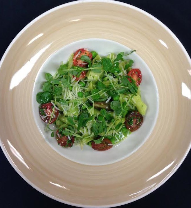 Garganelli Pasta with Mint Pea Sauce garnished with microgreens