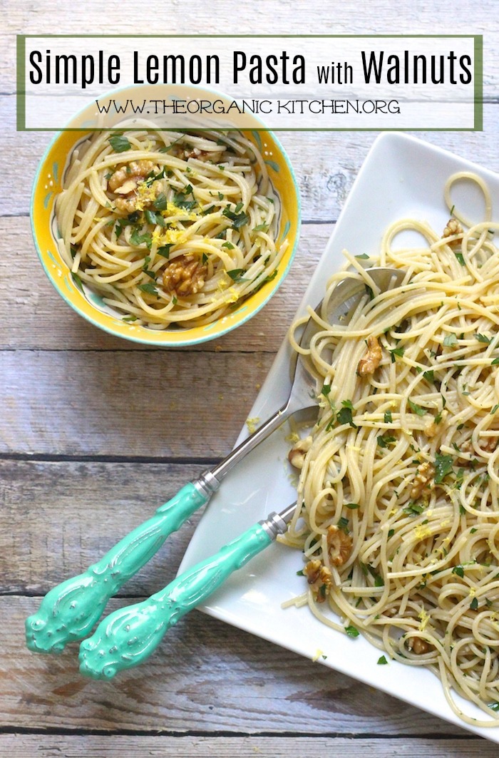 Simple Lemon Pasta with Walnuts in a yellow bowl next to a white platter
