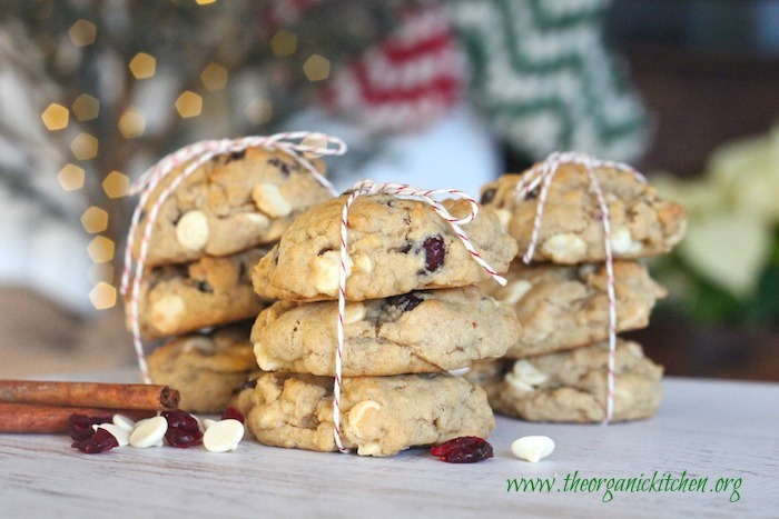 White Chocolate Cranberry Bliss Cookies stacked and tied with holiday string