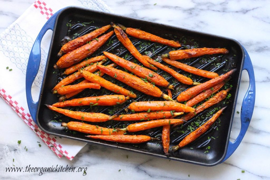 Roasted Baby Carrots with Honey and Ginger on blue grill pan