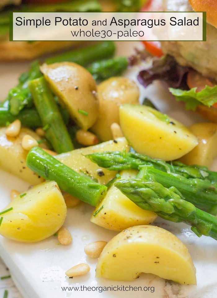Simple Potato and Asparagus Salad garnished with pine nuts
