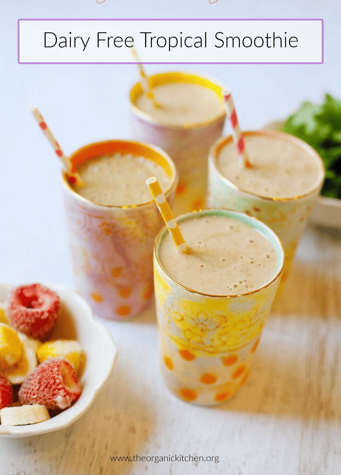 Four glasses with straws on white table: The Tropical Smoothie (Dairy Free)