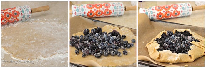 Pie crust with blackberries being folded into a galette