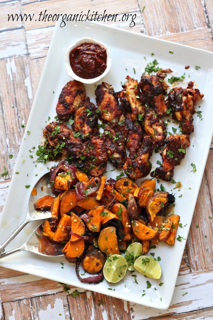 Whole 30-Paleo Chipotle Chicken Wings and Roasted Sweet Potatoes on a white platter