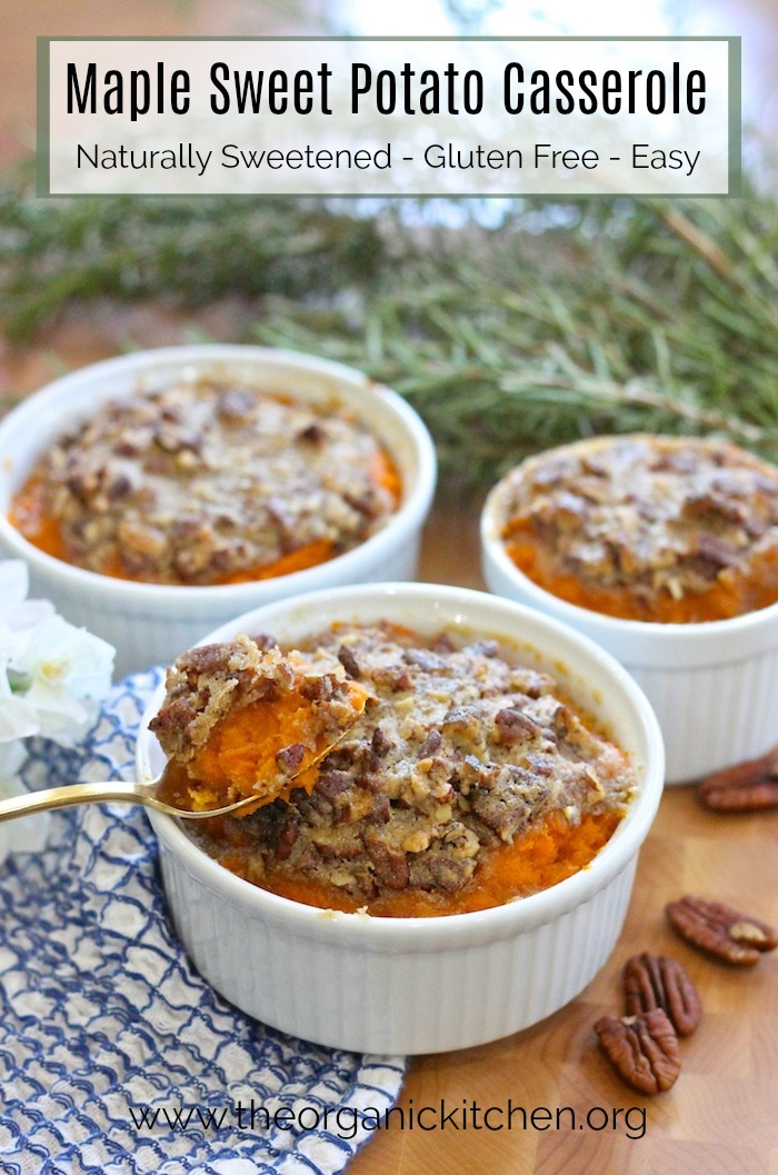 Maple Sweet Potato Casserole with crumbled pecan topping in white ramekins