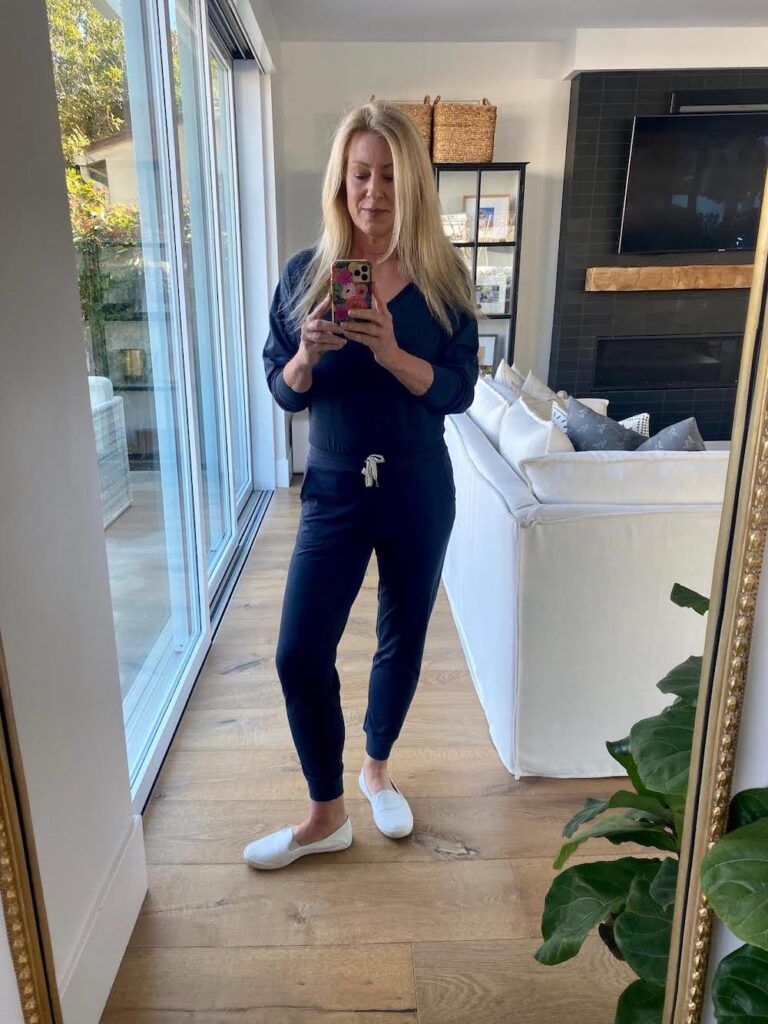 How to Do a Whole30 Without Losing Your Mind A woman taking a selfie in the mirror