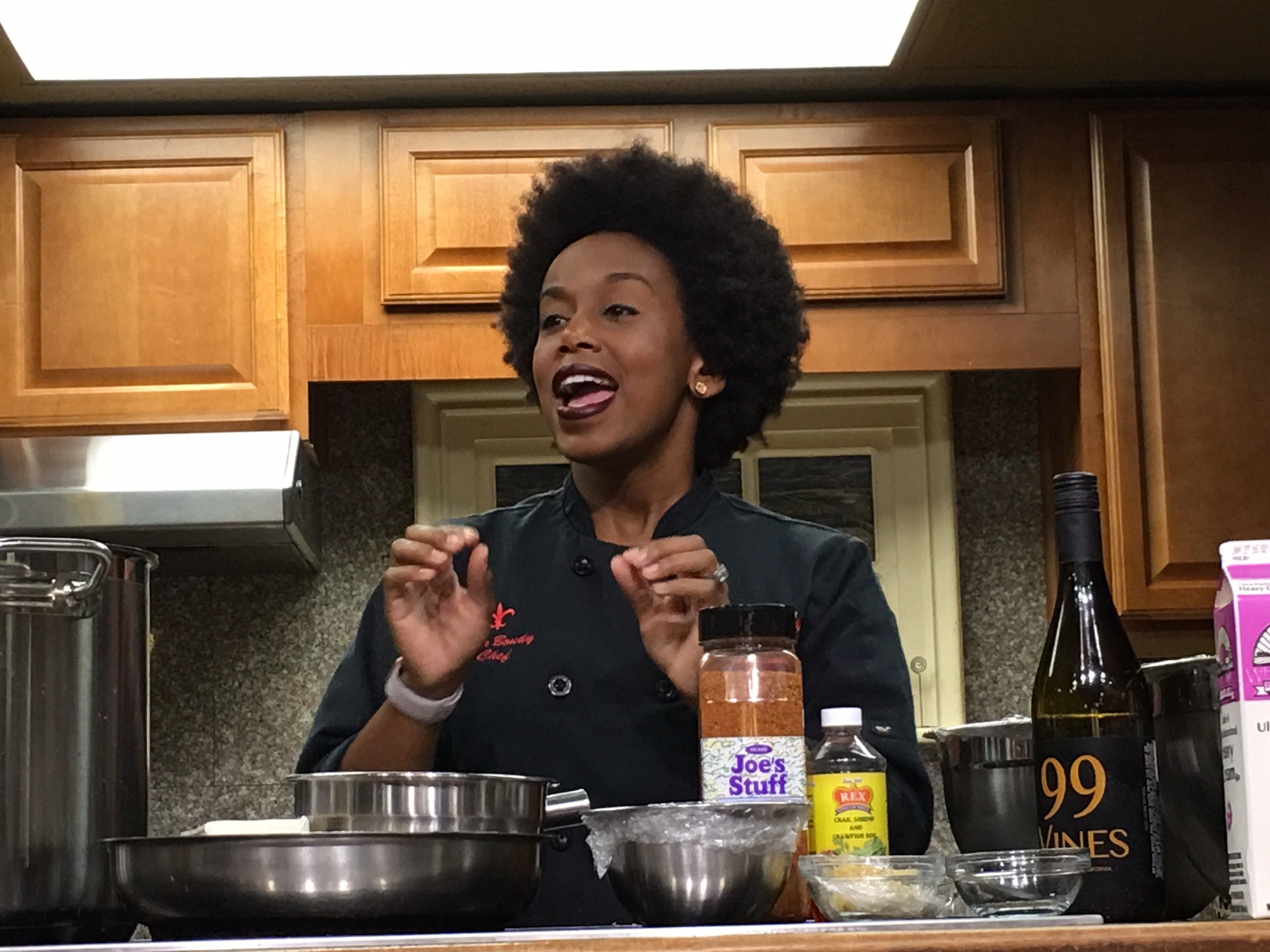 A photo of Chef Toya who taught us to make Shrimp (or Chicken) Artichoke Soup!