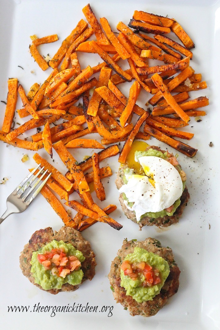 A white platter with three Jalapeño Turkey Burgers and butternut squash "fries"