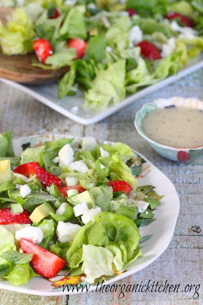 Strawberry Avocado Salad with Lemon Poppyseed Vinaigrette on white plate