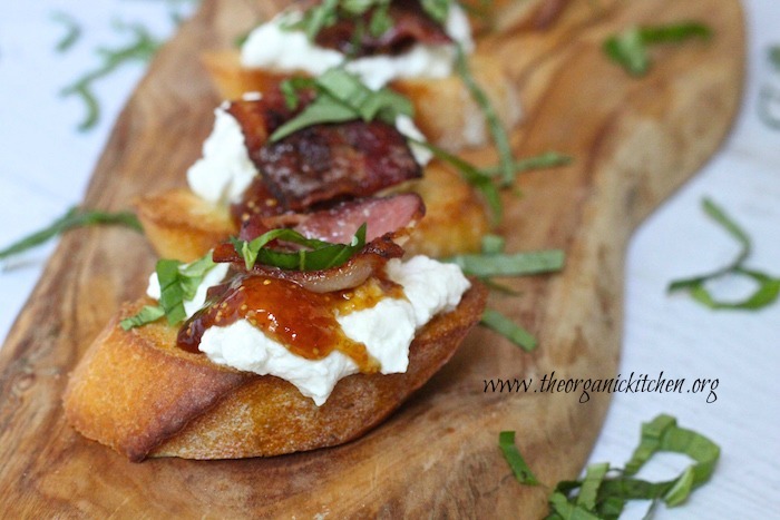 Bacon Ricotta Bruschetta with Fig Jam garnished with basil