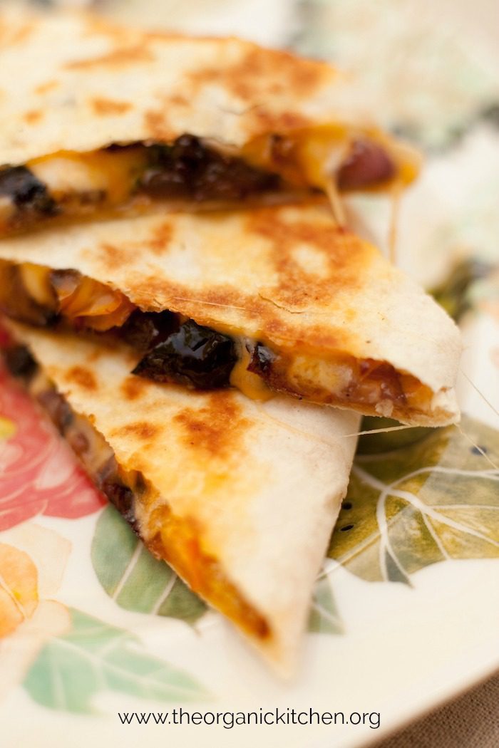 A Collection of Recipes for Cinco De Mayo! Caramelized Vegetable Quesadillas on colorful plate