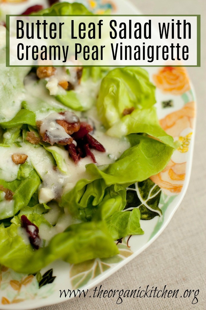 Butter Leaf Salad with Creamy Pear Vinaigrette on a colorful dish