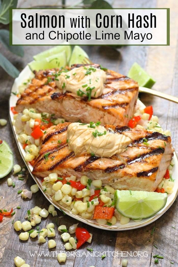 Salmon with Corn Hash and Chipotle Lime Mayo on a platter set on a wooden surface