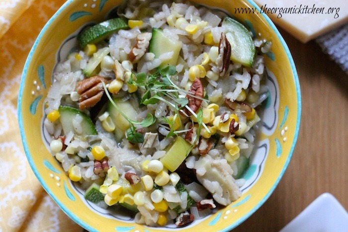 Oh My Gosh This is So Good Risotto in yellow bowl with yellow dish towel underneath