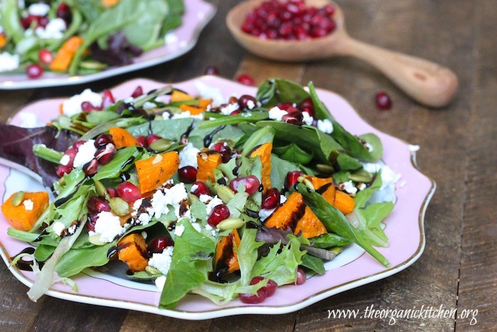 Greens with Roasted Sweet Potatoes and Pomegranate Seeds