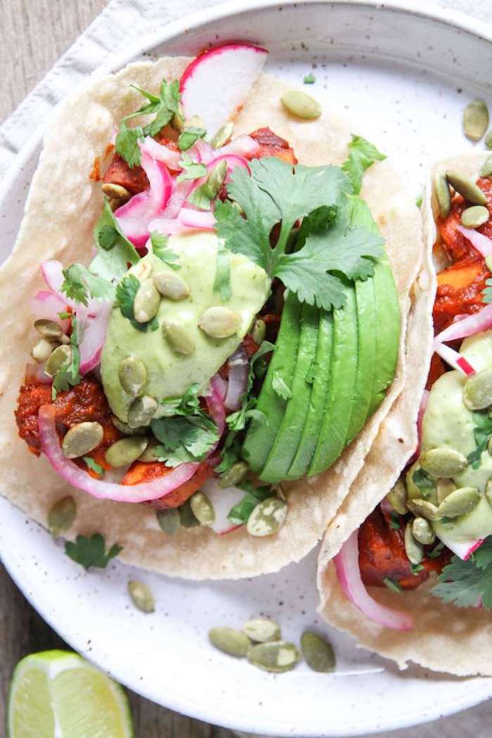 Vegetarian Avocado Tacos on white plate as part of 50+ Taco, Tostada and Fajita Recipes!