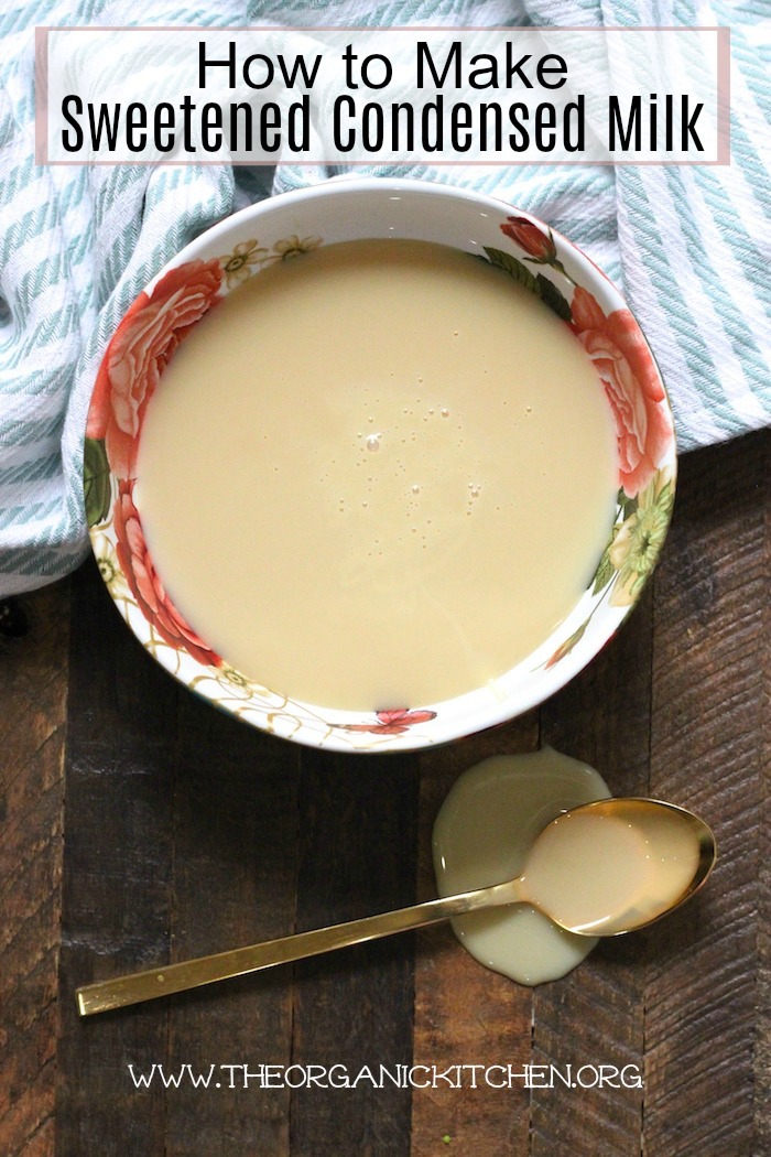 Homemade Sweetened Condensed Milk in a small bowl on a wooden table