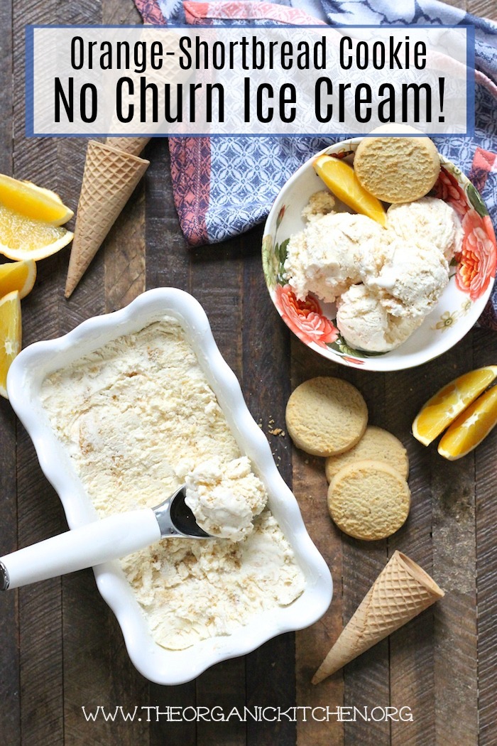 A white dish filled with Orange-Shortbread Cookie 'No Churn' Ice Cream surrounded by shortbread cookies