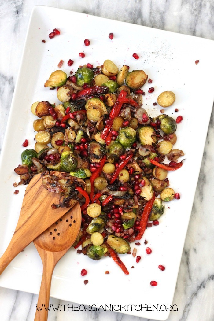 A white platter of roasted fingerling potatoes and Brussels sprouts as part of 12 Healthy Whole 30 Vegetable Side Dishes! 