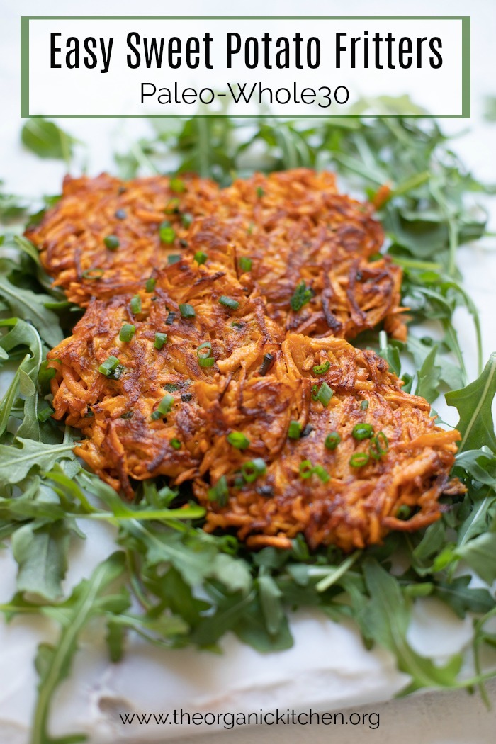 Easy Sweet Potato Fritters-Paleo/Whole 30 sitting on a bed of baby arugula