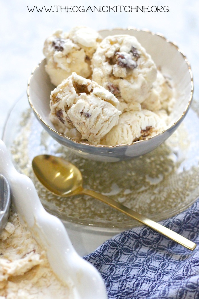 Salted Caramel Pecan 'No Churn' Ice Cream in bowl on saucer with gold spoon