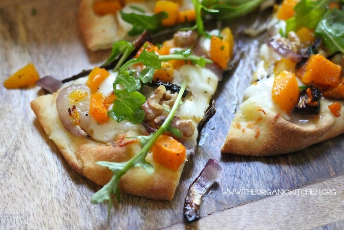 Butternut Squash Grilled Naan Pizza on wooden cutting board