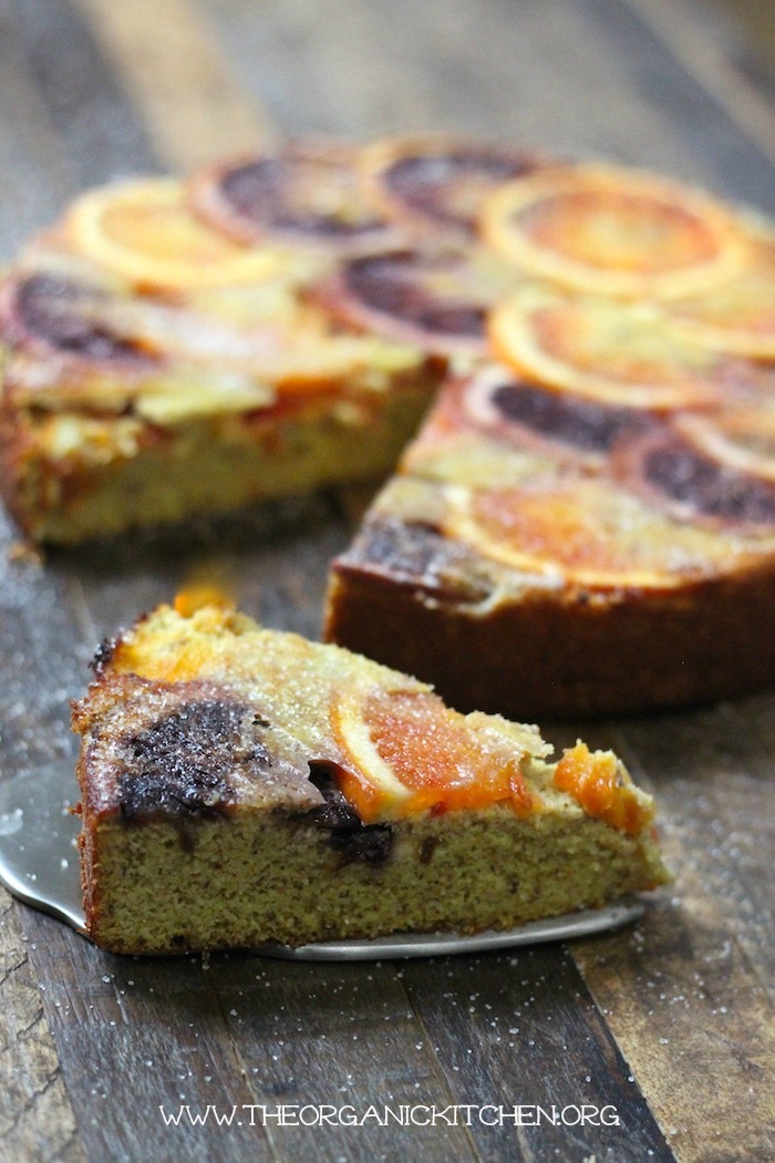 Upside Down Orange Almond Cake with a slice removed