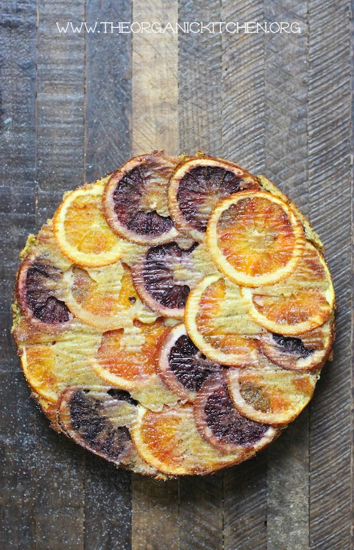 Upside Down Orange Almond Cake on wooden board